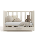 Malta frosted oat crib with drawer converted to daybed