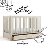 Malta frosted oat crib with drawer with black doodles overlaid on image