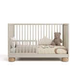 Sorrento frosted oat and driftwood crib converted to toddler bed
