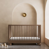 Sorrento hazelnut crib in a nursery
