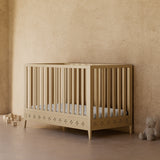 Mallorca driftwood crib in a nursery