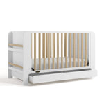 Read-with-me white with driftwood crib with drawer open angle view