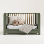 Graco® Read-with-Me™ 4-in-1 Convertible Bookshelf Crib with Drawer.