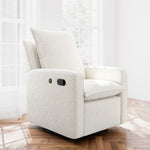timeless ivory boucle glider in a nursery