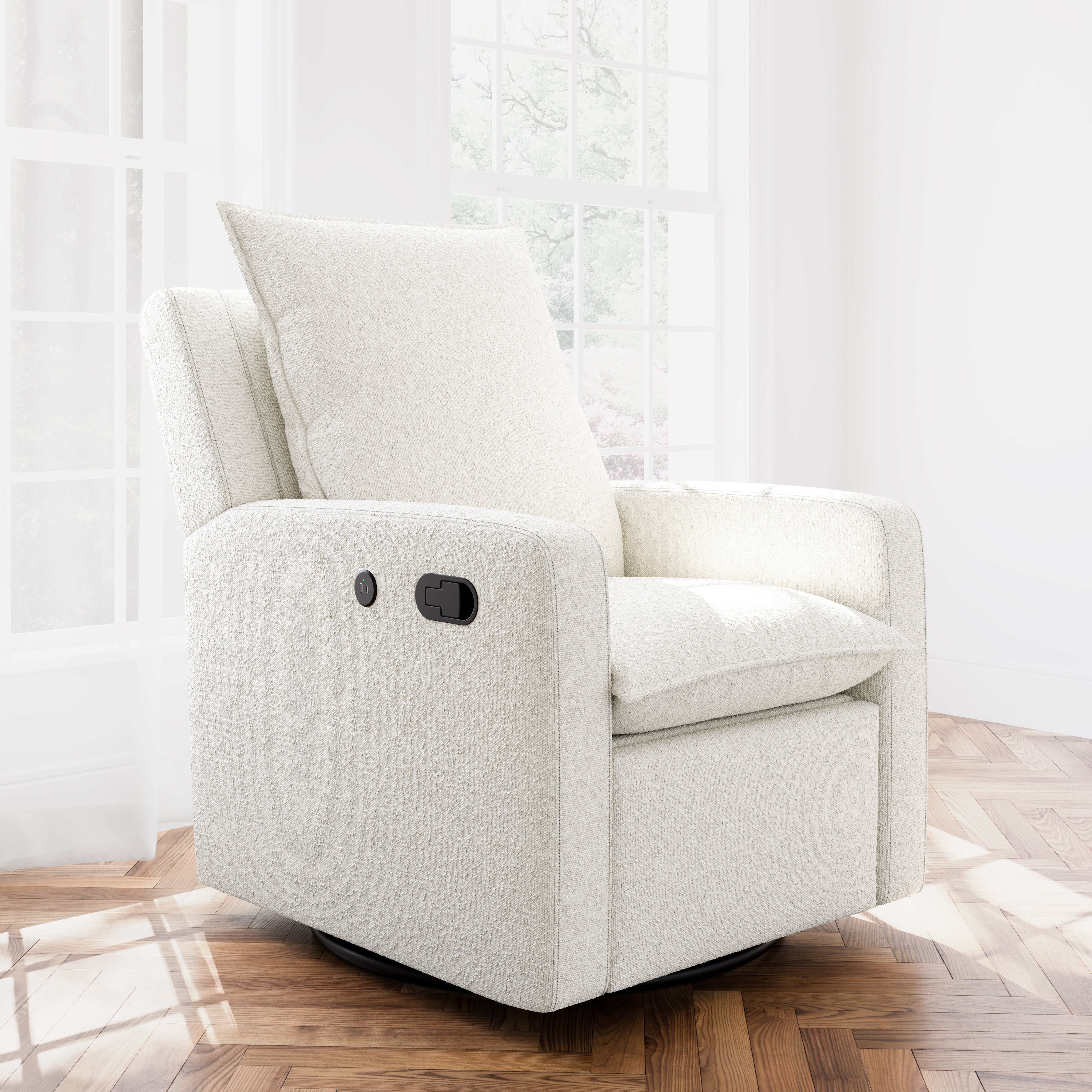 timeless ivory boucle glider in a nursery