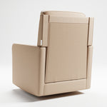 Swivel glider with latte fabric in a room