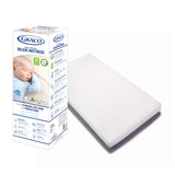 unpacked baby mattress and its box