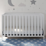 White crib in nursery