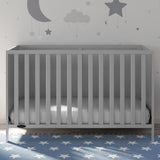 Pebble gray crib in nursery