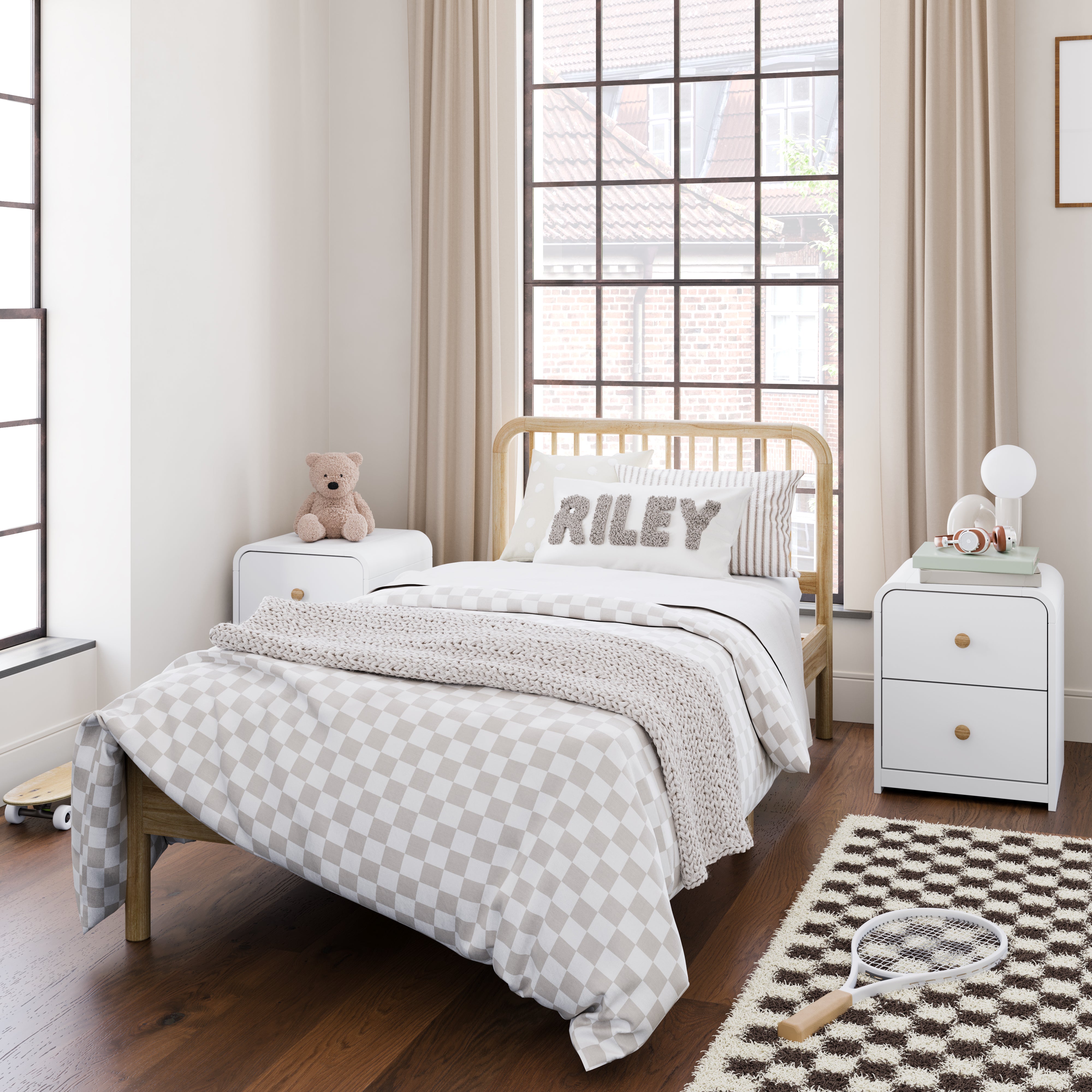 2 Santos white 2 drawer nightstands in kids bedroom with bed in middle